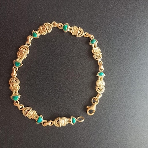 Pulsera Mini-Tumi de Oro de 18 Kt