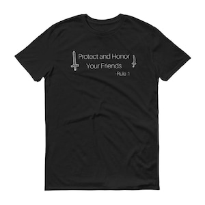 May include: Black t-shirt with the white text "Protect and Honor Your Friends - Rule 1" and two small sword illustrations. The shirt is a short-sleeved crew neck.