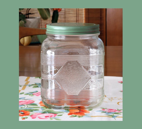 Vintage Ribbed Glass Kitchen Storage Jar with Green Metal Lid Anchor Hocking
