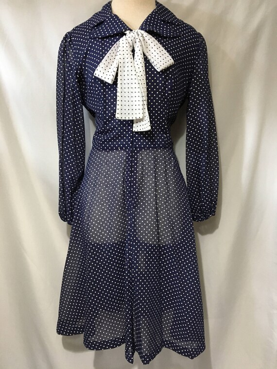 long sleeve navy polka dot dress