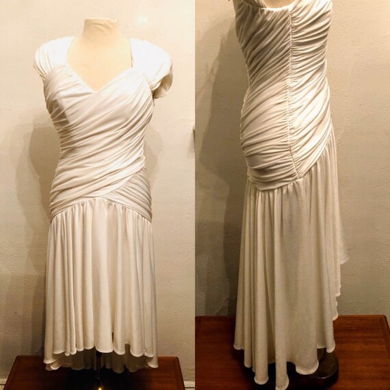 get ready to Climax in this white poly ruched jer