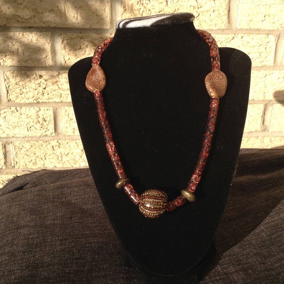 Bead necklace with ball charm
