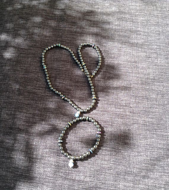 Magnetic hematite bead set with charms