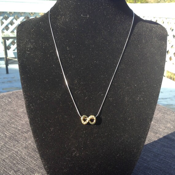 Sterling silver chain with infinite pendant