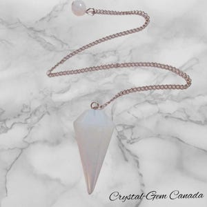 Opalite Pendulum with Silver Plated Chain, including a velvet bag. Promote psychic ability and optimism. - Reiki Infused.