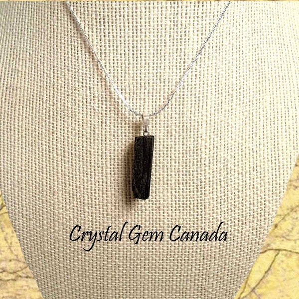 Raw Black Tourmaline. Necklace with Silver Plated Chain. Tourmaline is a protection stone that keep you grounding and in control.