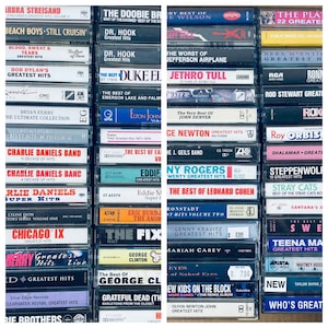 May include: A collection of vintage cassette tapes featuring various artists and albums, including Barbra Streisand, The Doobie Brothers, Jefferson Airplane, Jethro Tull, John Denver, and many more. The tapes are arranged in rows and columns, with the titles and artist names visible on the labels.