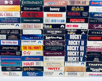 Películas VHS de los 80 y 90, 5 dólares cada una, elige la tuya: Rocky, Harry Potter, La Bamba, Epidemia, De nueve a cinco, Excalibur, El vengador del futuro, Hoosiers, Tested