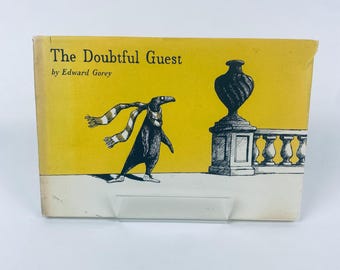El huésped dudoso de Edward Gorey (1978) Primera edición, tapa dura, sobrecubierta, excelente estado