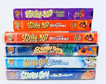 Scooby-Doo VHS, Built a Lot, Vintage 90s, Cartoons: Zombie Island, Boo Brothers, Goes Hollywood, Arabian Nights, Winter Wonderdog All TESTED
