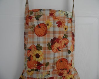 Short bibbed craft apron with two pockets