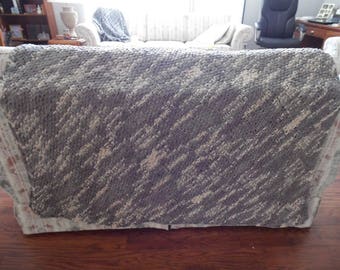 Gray and beige soft hand-knit blanket