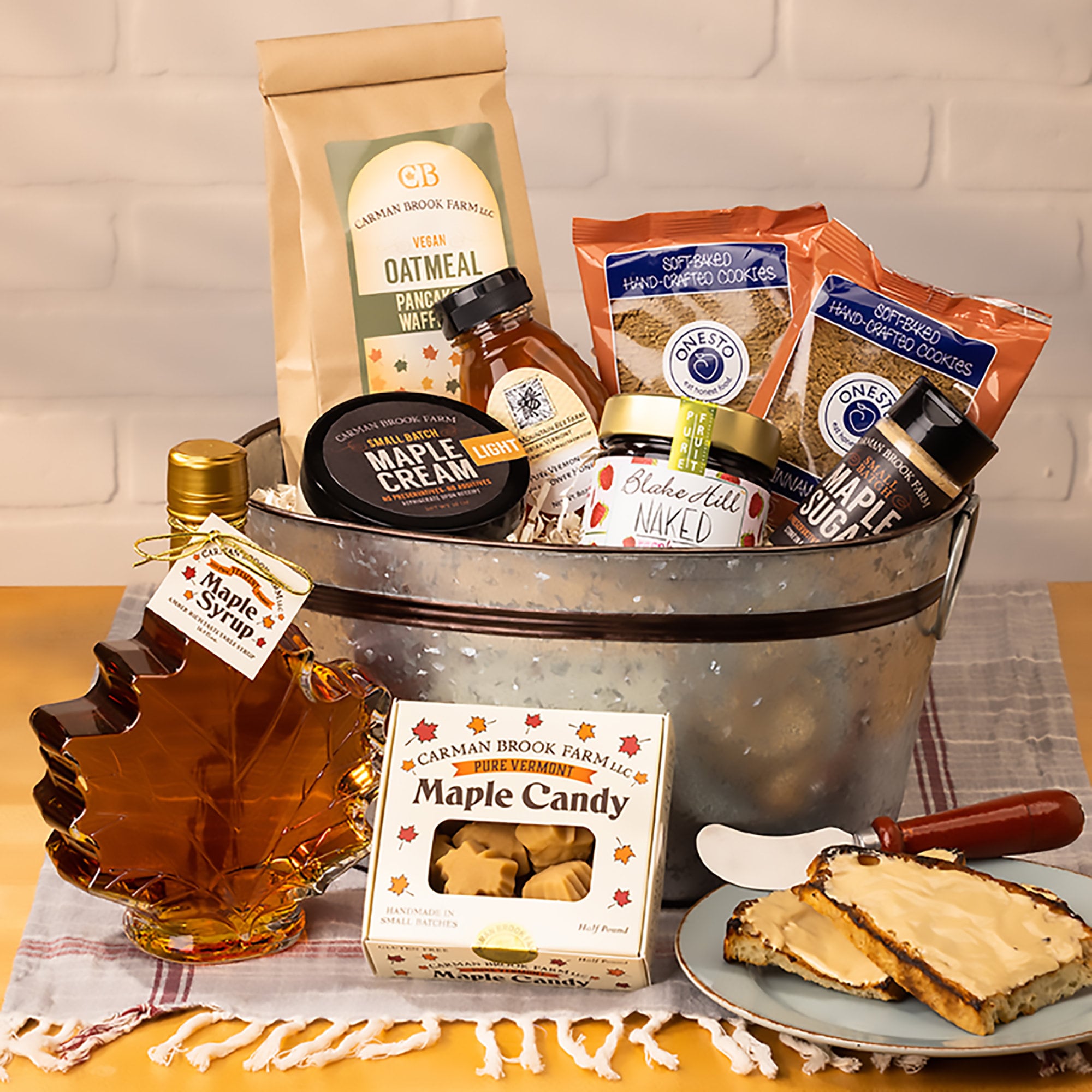 This tin is filled with 100% pure Wisconsin maple syrup, pancake mix with  extra flavor, and fresh roasted coffee roasted just before shipping. -  Northern Harvest Gift Baskets