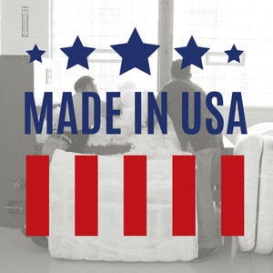 May include: A close-up of a white cotton bale with red and white stripes, with the text "MADE IN USA" in blue letters. There are five blue stars above the text.