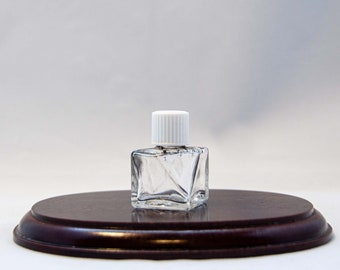 Mini bouteille transparente vintage unique à facettes