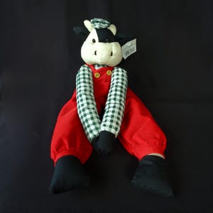Farmer Cow with Clasping Hands