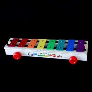 Mid-Century Fisher Price Pull A Tune Toy