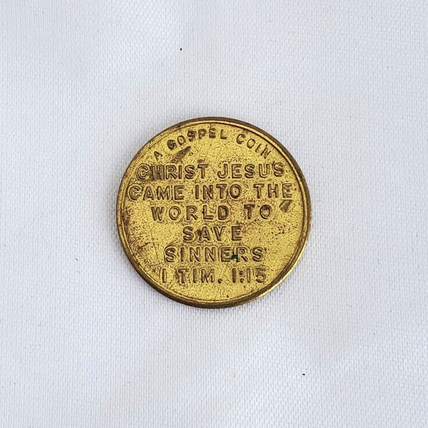 1960's "Gospel Coin" 1 Timothy Chpt 1 Vrs 15, Hebrews Chpt 2 Vrs 3 From the Good News Publications