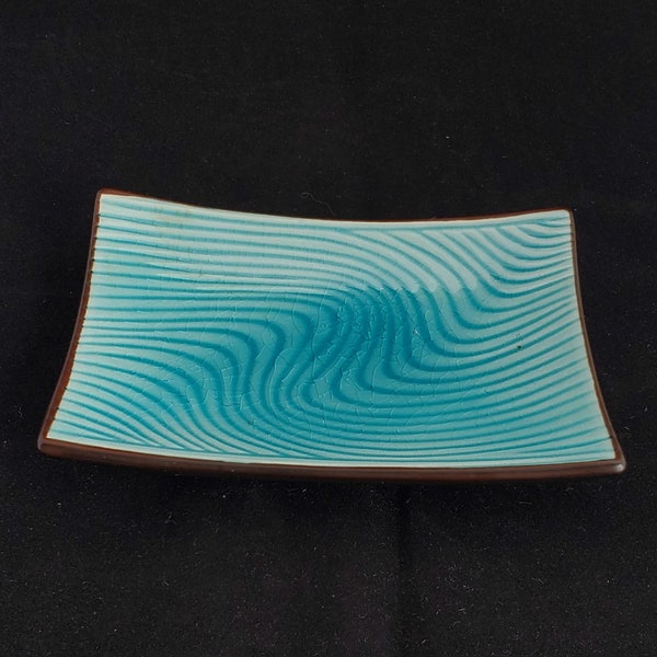 Ceramic Sushi Dish with Waves of Turquoise and a black backing