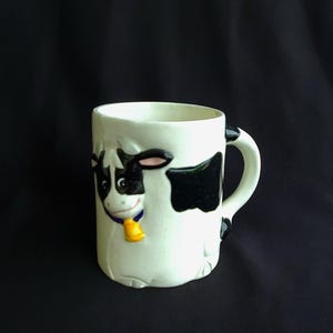 3D Cow Mug with Happy Face and a Tail for a Handle