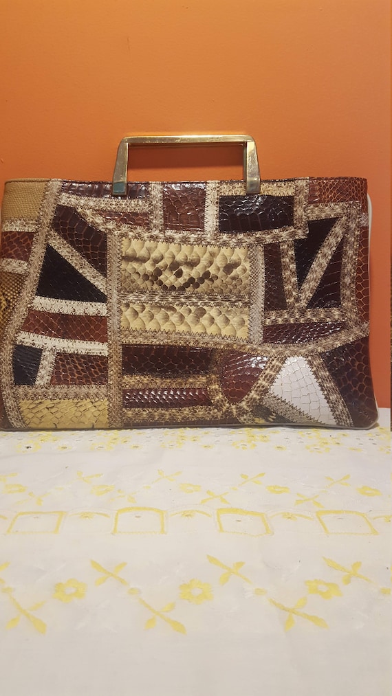 Caprice snakeskin purse