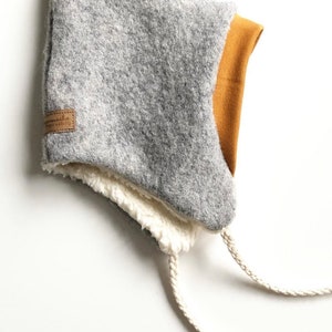 Dwerghoed, wollen hoed, volle hoed, puntmuts, namaakbont bobbel, babymutsje, kinderhoed, scheerwol