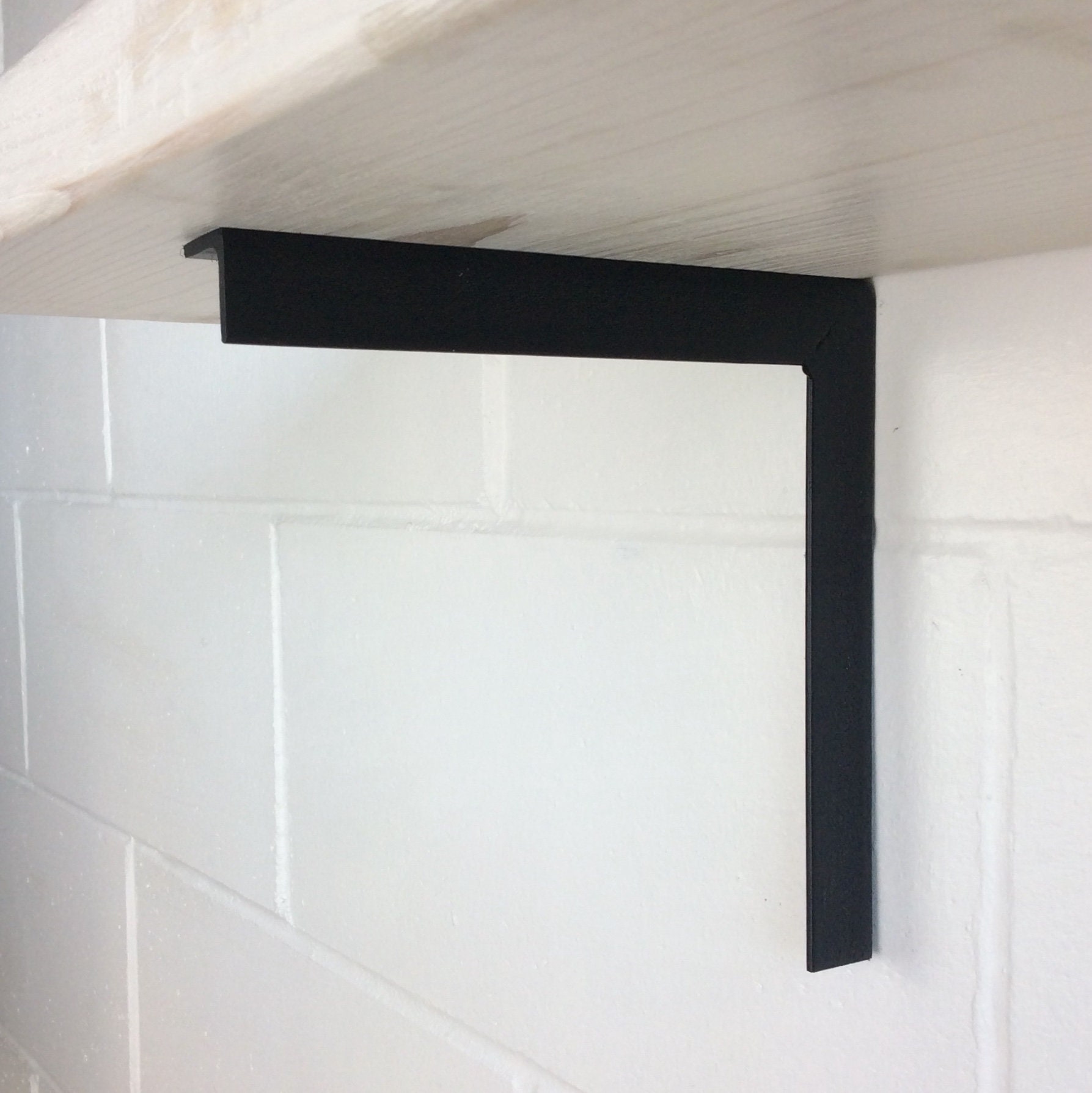 minimalist shelf brackets black