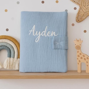 Personalized baby health record cover with blue first name