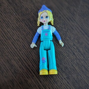 Fisher Price Sweet Streets Go Anywhere girl (c)