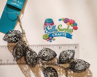 Hildie & Jo Strung on a chain, Mixed Metal Bead on with clear stones inside.  Jewelry Making Supplies!