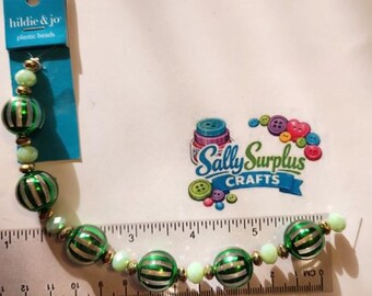 Hildie & Jo Strung Plastic Bead. Transparent with shiny green stripes, Jewelry Making Supplies!