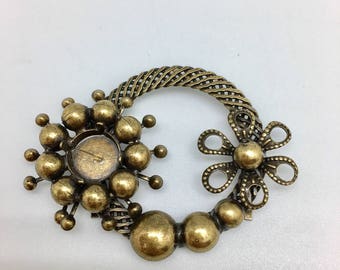 Pièce à sertir, boucle de ceinture ou broche