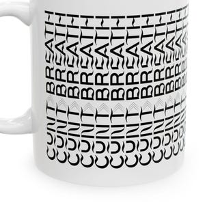 May include: A white ceramic mug featuring a repeating black text pattern. The text reads CUNT BREATH in a stacked, vertical orientation, covering the exterior surface of the mug. The mug has a standard handle on the left side and a smooth finish.