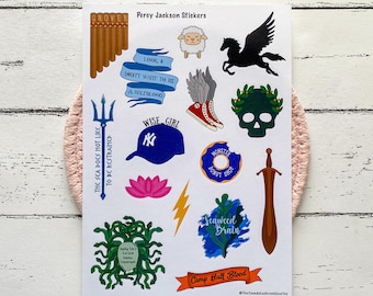 May include: A sheet of Percy Jackson stickers featuring various designs. Included are a trident, a baseball cap, a Pegasus, a skull with a laurel wreath, and text that reads "Camp Half Blood" and "Seaweed Brain".
