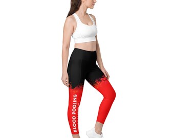May include: Black and red leggings with a white graphic that says "BLOOD POOLING AWARENESS".