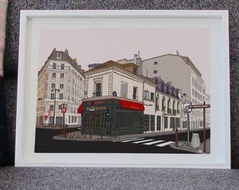 Puede incluir: Una impresión enmarcada que representa una escena callejera parisina con edificios, un café con toldo rojo y señales de tráfico. La obra de arte está en un marco blanco, sobre una superficie gris, con un cojín a cuadros en el fondo.
