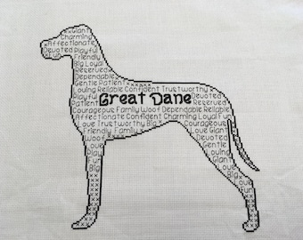 May include: Black and white cross-stitch design of a Great Dane dog. The dog's outline is formed by words describing the breed's personality, such as 'loyal', 'friendly', 'gentle', and 'trustworthy'.