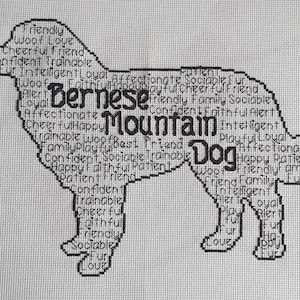 Op de afbeelding: Zwart-wit kruissteekontwerp van een Berner Sennenhond silhouet, gevuld met beschrijvende woorden zoals "Vriendelijk", "Trouw" en "Trainbaar". Het woord "Berner Sennenhond" is prominent aanwezig.