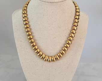 Gargantilla Art Déco dorada: diseño vintage de los años 90 con cierre de palanca.