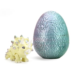 Brinquedo antiestresse impresso em 3D: Triceratops bebê com ovo que muda de cor, presente de Natal para crianças.