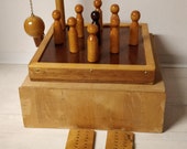 Wooden bowling game with 9 cones and score plates