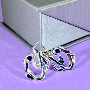 Sterling silver earrings with blue sapphires