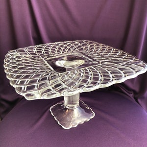 Beautiful clear glass cake stand (not in perfect condition, moderate scratches)