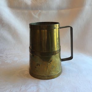 Vintage rustic brass mug with patina