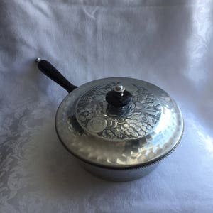 Vintage hammered aluminum pan with lid