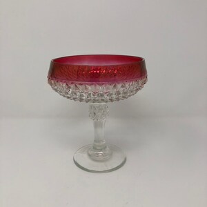 Vintage clear glass diamond point pedestal compote, with cranberry flashing