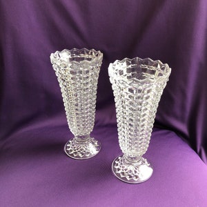 Set of two pretty clear glass vases