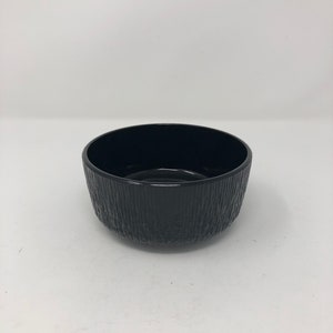 Vintage small black glass bowl