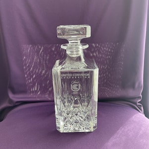 Crystal glass decanter with stopper (has custom etched logo)