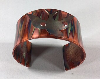 Dove of copper coated brass on flame painted copper bracelet or cuff